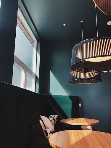 seattle brown wooden round table with chairs light fixture